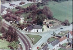 Date unknown. aerial view of No 2 Pemberton Arms facing War Memorial Green in centre, High St to left, Station Rd to right.