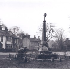 War Memorial NB bottom left metal railing & lamp surrounding pump 1982 | (Deacon)