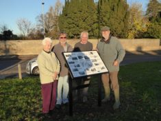 Irene Deacon (supplied photos), John Roadley (researcher), Nigel Schoepp, Peter Griffin (volunteer sign installers) beside the new Interpretation Board on The Green, Nov 2016