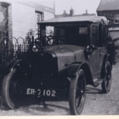 PHS028.01 No 28 High St, H J Ellis the butchers (Deacon) Early car outside No 28 High St, H J Ellis the butchers | (Deacon)
