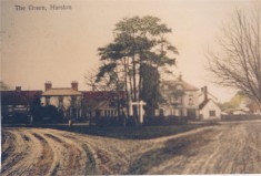 Row of buildings fronting the Green owned by C Wedd, Saddler