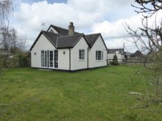 New sun room replacing conservatory, seen from south west corner of plot