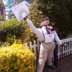 PZZECov.15 scarecrow Albert RN ( Bert ) with his rainbow poster May 2020 (Marriott) Bert with his rainbow poster of hope 'Every cloud has a silver lining' May 2020 | (Marriott)