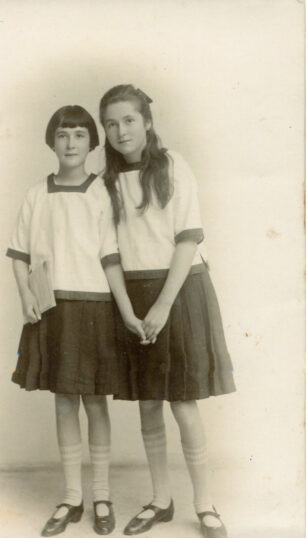 Anita & Margaret wearing clothes made by Mother